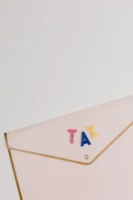 Pink envelope with TAX letters - Credits: pexels