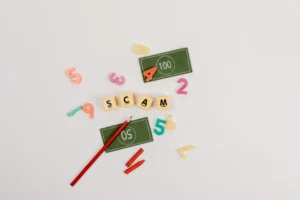 Creative flat lay of scam - Credits: pexels
