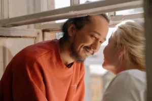 A young couple sharing a - Credits: pexels