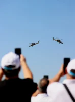 Spectators capture helicopters performing in - Credits: pexels