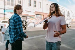 Two men engaging in a - Credits: pexels