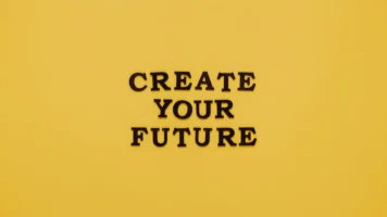 Bold text 'CREATE YOUR FUTURE' - Credits: pexels