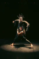 Two dancers in unique costumes - Credits: pexels