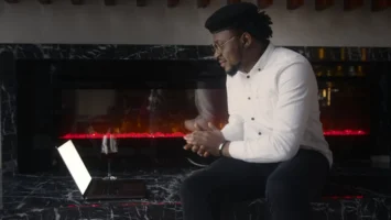 Casually dressed man using a - Credits: pexels