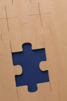 Wooden puzzle with a single - Credits: pexels
