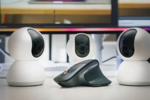 Three white webcams and a - Credits: pexels