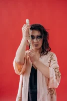 Artistic portrait of a woman - Credits: pexels